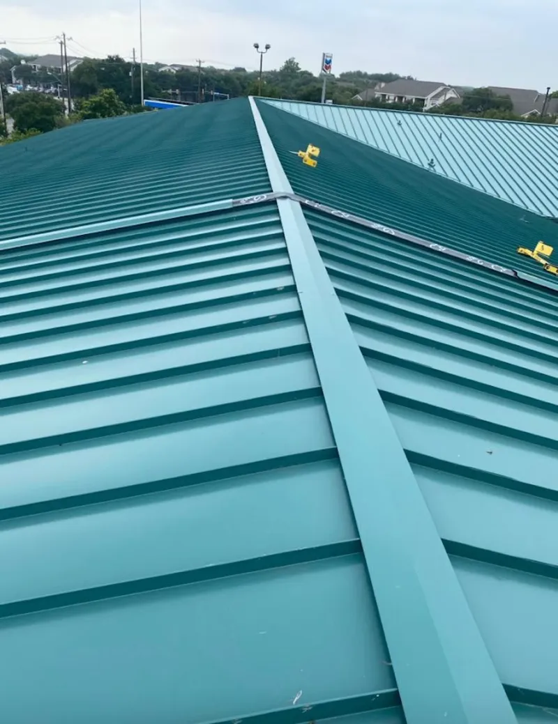 Green commercial metal roof ridge and valley for Metal Roof Repair in North Branch
