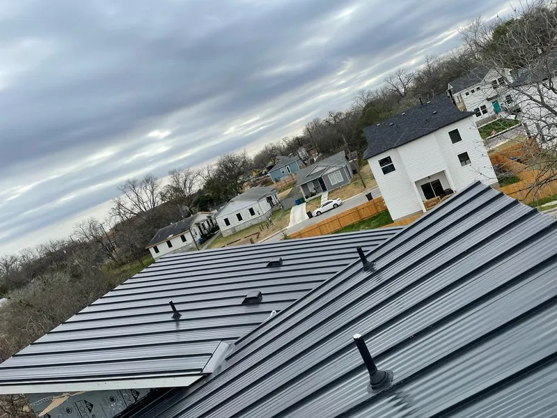Standing seam metal roof panels with vents for Skylight Repair in North Branch